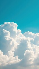 Vast, cloud-streaked azure sky, bright sunlight, spacious, cloud formations