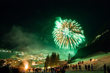 New year's eve fireworks in the mountains, Dolomites, Italy