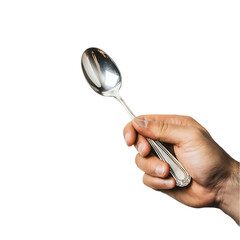 Hand holding a silver spoon against a black background.