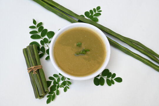 Moringa oleifera or drumstick pods soup. Moringa oleifera other names moringa, horseradish, and ben oil tree and benzolive. Healthy and tasty soup. Healthy drinks. 