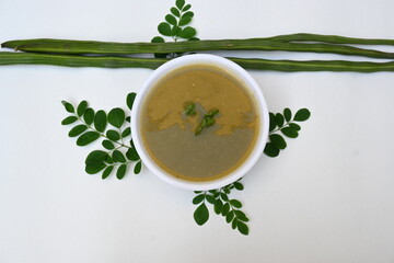Moringa oleifera or drumstick pods soup. Moringa oleifera other names moringa, horseradish, and ben oil tree and benzolive. Healthy and tasty soup. Healthy drinks. 