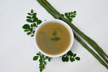 Moringa oleifera or drumstick pods soup. Moringa oleifera other names moringa, horseradish, and ben oil tree and benzolive. Healthy and tasty soup. Healthy drinks. 