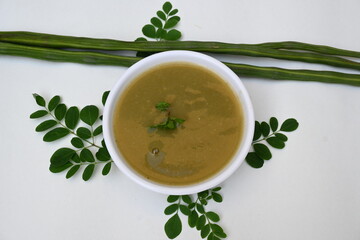 Moringa oleifera or drumstick pods soup. Moringa oleifera other names moringa, horseradish, and ben oil tree and benzolive. Healthy and tasty soup. Healthy drinks. 