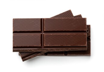 A close up view of three bars of dark chocolate stacked on a white surface in a studio shot