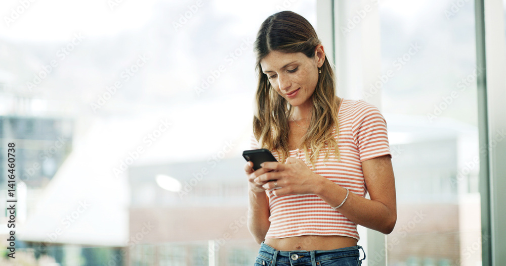 Poster woman, phone and typing at window with relax, social media and message in texting app. female person