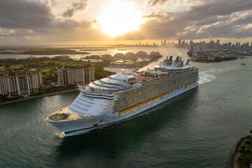 Aerial view of large cruise liner departing from Miami port. Travel to Florida vacation concept