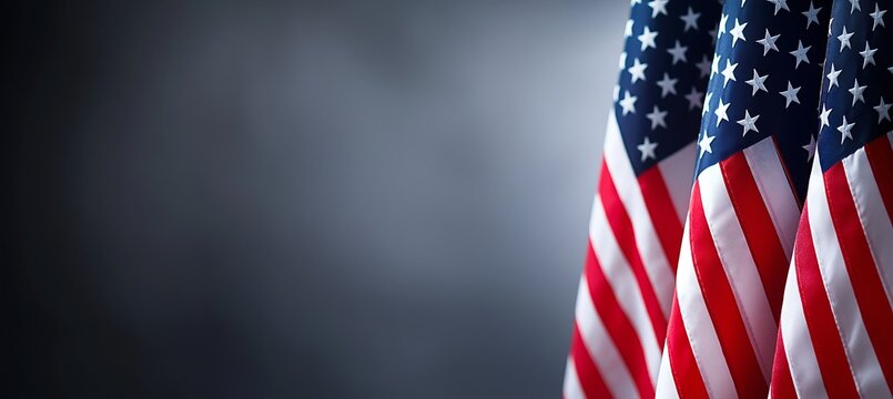 Three USA Flags on a Muted Background: Perfect for Memorial or Patriotic Themes