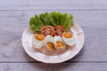 Salted eggs are eggs that are salty by pickling in brine. Or masked with salt mixed with ashes or chaff