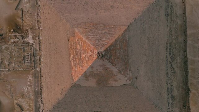 Top Down View Of Pyramid At The Giza Plateau In Egypt - Drone Shot