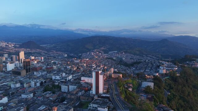 Aerial View Manizales Chipre Neighborhood with Mountains in the Background Pull Back Shot