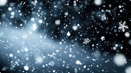 Obraz premium Enchanting winter snowfall abstract with delicate snowflakes motion backdrop