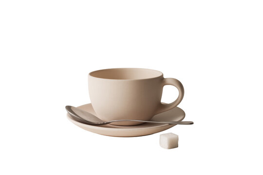Beigefarbene Kaffeetasse mit Untertasse, L&ouml;ffel und Zuckerw&uuml;rfel PNG mit transparentem Hintergrund

