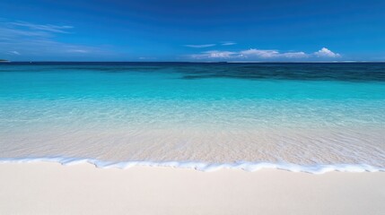Obraz premium Pristine beach meets turquoise sea under a vibrant sky. Tranquil tropical paradise