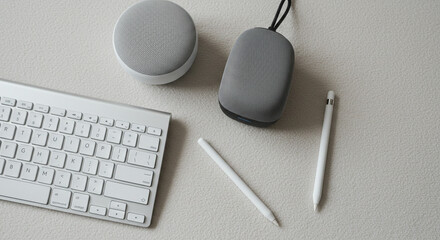 Minimalist Workspace Setup: Grey and White Tech Accessories