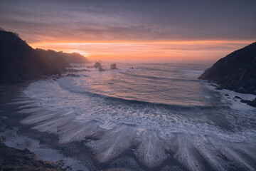 Sunset in the bay. Sunset falls on the bay as the tide rises.
