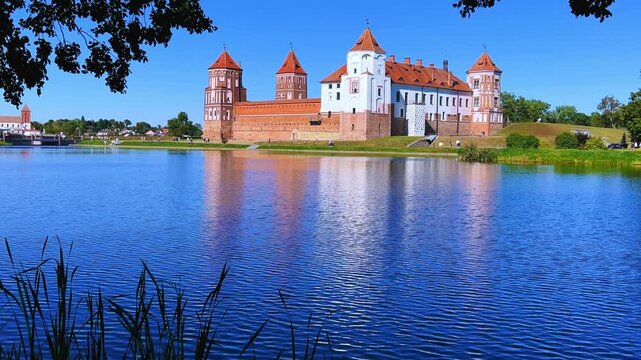 Mir Castle complex. The Architectural Ensemble Of Feudalism, An Ancient Cultural Monument, A UNESCO World Heritage Site. Under the Blue Sky, Mir Castle of the XVI-XX centuries. Belarusian Gothic. 4К