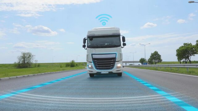 A self-driving truck drives autonomously on the highway. The future of transportation. Smart Transportation System. The concept of smart transportation logistics