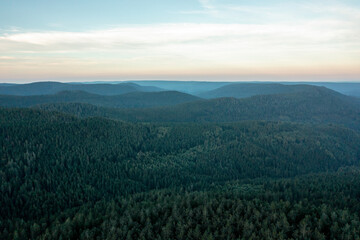 Naklejka premium Black Forest drone aerial view, horizon over mountains in the evening