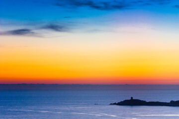 Omigna Genoese tower, in the Corsican maquis, Cargèse, Corsica island, France. Typical tower in tourist trail on the Mediterranean Corsican coast.