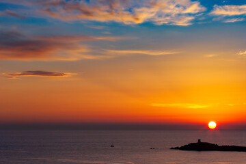 Omigna Genoese tower, in the Corsican maquis, Cargèse, Corsica island, France. Typical tower in tourist trail on the Mediterranean Corsican coast.