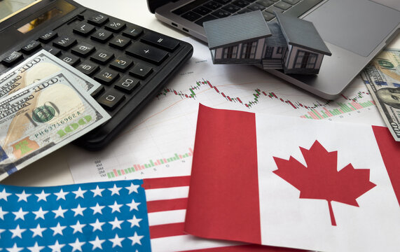 flags of the USA and Canada, dollars, charts