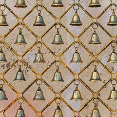 Golden Bells Symmetrical Pattern Closeup Beige Background Vertical View