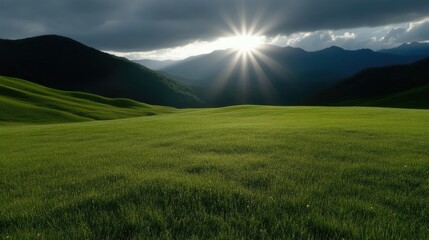 Sunset over a grassy mountain valley
