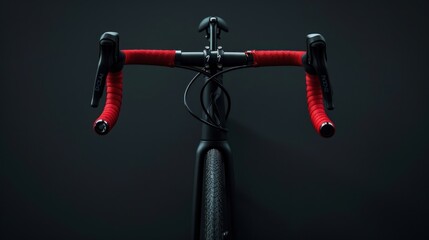Sleek gravel bike with vibrant red handlebar tape against a dark backdrop