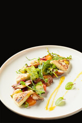 Exquisite dish of grilled vegetables with haloumi cheese and fresh herbs created in a modern kitchen setting