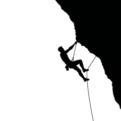 Silhouette of a Climber Ascending a Steep Rock Face