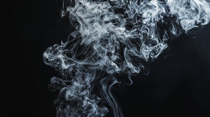 Swirling smoke trail on black background