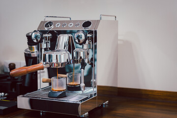 Espresso machine brewing a fresh coffee.