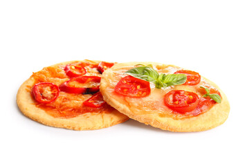 Different tasty mini pizzas on white background