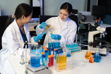 Fototapeta premium Glass vial, pipette and scientist in laboratory for medical study, research or experiment. Test tube, dropper and professional person with chemical liquid for pharmaceutical innovation.