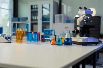 workspace area science lab test tubes, lab equipment.