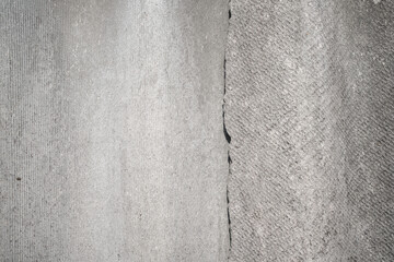 Old and very dangerous asbestos roof. Asbestos dust in the environment. Asbestos removal