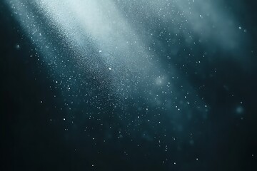 Light beam with dust particles, and dark.