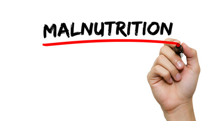 Hand Underlining Malnutrition with Red Marker on White Background Nutrition Concept