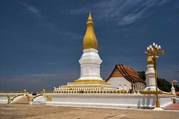 Naklejka premium The golden stupa of Sikhottabong, between history and spirituality