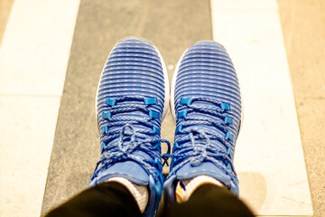 Blue sneakers for travelers that are safe
