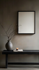 Blank frame mockup on a neutral wall with rustic black bench, ceramic vase with dry branches, and lit candle. Perfect for minimalist artwork or interior design presentations