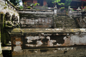 Bathing temple figures or holy water fountain of Goa Gajah or Elephant Cave significant Hindu...