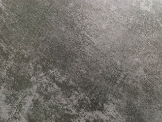 Grey background. An old worn-out gray wall. Grey marble texture.