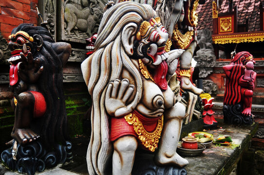 Art sculpture and carved antique deity angel god of hindu statue balinese style in Pura Ulun Danu Bratan or Pura Bratan Hindu Shaivite Shiva temple in Bratan near Bedugul in Bali, Indonesia