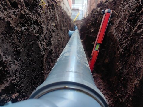 Plastic sawage pipes in the ground for rainwater drainage