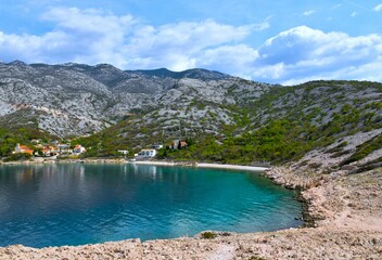 Bay at the Adriatic sea ext to Lukovo village bellow rocky slopes of Velebit mountains in Croatia
