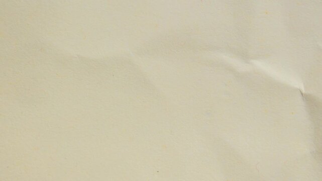 Crumpled paper as background creased craft paper texture design element blank paper sheet, stop motion animated background video