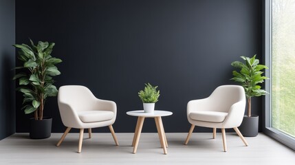 Modern, minimalist living room corner with two comfortable armchairs and a small side table, accented by lush greenery.  