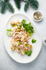 Potato salad with ham and pickled mushrooms