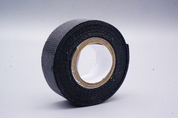 Black Duct Tape Roll on White Background for Crafts and Repairs